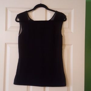 Black top with sheer cap sleeves.